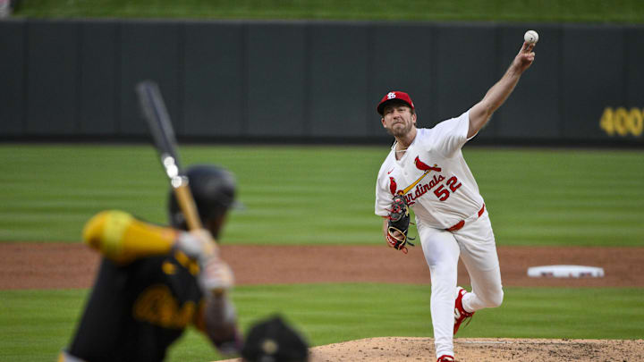 May 6, 2025; St. Louis, Missouri, USA;  St. Louis Cardinals starting pitcher Matthew Liberatore (52) pitches against Pittsburgh Pirates designated hitter Andrew McCutchen (22) during the third inning at Busch Stadium. Mandatory Credit: Jeff Curry-Imagn Images