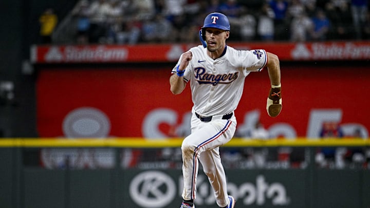 Mar 31, 2024; Arlington, Texas, USA; Texas Rangers right fielder Evan Carter (32) in action during