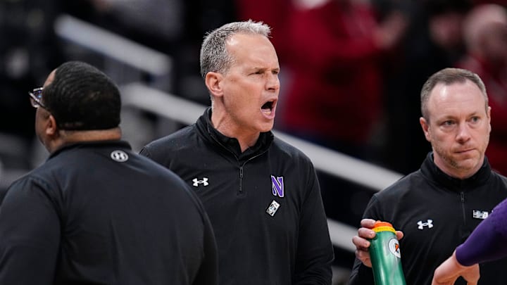 Northwestern Wildcats head coach Chris Collins yells to players on the court Thursday, March 13, 2025, during the second round of the men's Big Ten tournament at Gainbridge Fieldhouse in Indianapolis. The Wisconsin Badgers defeated the Northwestern Wildcats, 70-63.