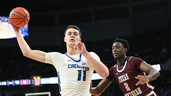 Nov 18, 2023; Omaha, Nebraska, USA;  Creighton Bluejays center Ryan Kalkbrenner (11) looks to drive