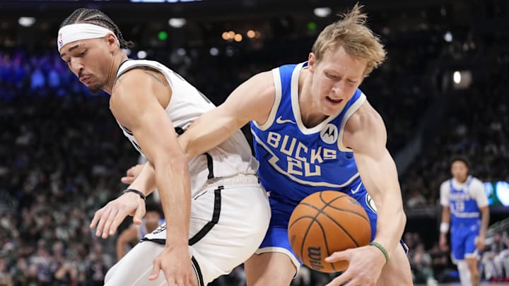 Dec 26, 2024; Milwaukee, Wisconsin, USA; Milwaukee Bucks guard AJ Green (20) and Brooklyn Nets forward Jalen Wilson (22) chase the loose ball during the first quarter at Fiserv Forum. Mandatory Credit: Jeff Hanisch-Imagn Images Dec 26, 2024; Milwaukee, Wisconsin, USA; Milwaukee Bucks guard AJ Green (20) and Brooklyn Nets forward Jalen Wilson (22) chase the loose ball during the first quarter at Fiserv Forum. Mandatory Credit: Jeff Hanisch-Imagn Images