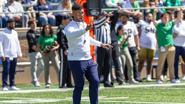 Apr 12, 2025; Notre Dame, IN, USA; Notre Dame head football coach Marcus Freeman calls a play during the Blue-Gold game at Notre Dame Stadium. Mandatory Credit: Michael Caterina-Imagn Images