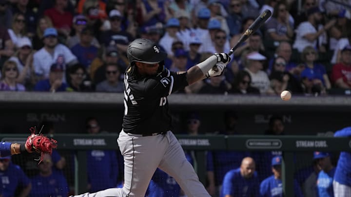 Chicago White Sox catcher Martin Maldonado (15) hits a single against the Chicago Cubs in the second inning at Sloan Park in 2024.