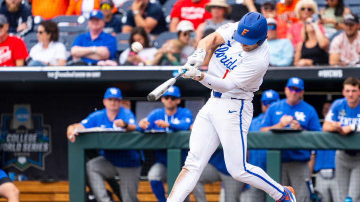 Florida Gators first baseman Jac Caglianone hits a record-breaking home run against the Kentucky Wildcats. Florida Gators first baseman Jac Caglianone hits a record-breaking home run against the Kentucky Wildcats.