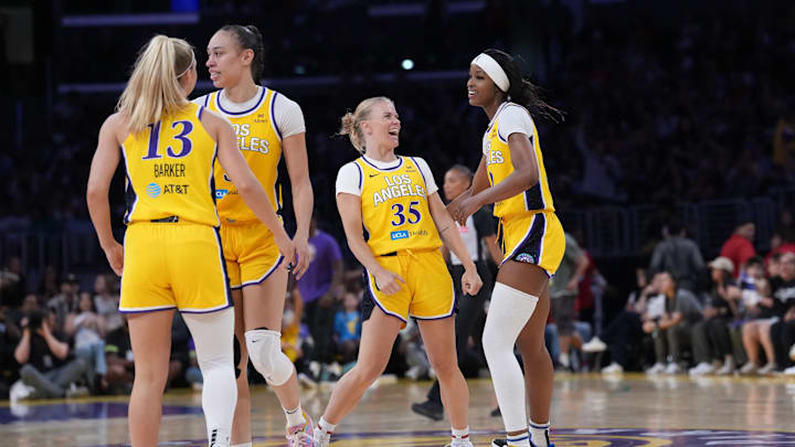 Aug 5, 2025; Los Angeles, California, USA; LA Sparks guards Sarah Ashlee Barker (13) and Julie Vanloo (35) and forwards Dearica Hamby (5) and Rickea Jackson (2) interact during a break in the action in the second half against the Indiana Fever at Crypto.com Arena. Mandatory Credit: Kirby Lee-Imagn Images