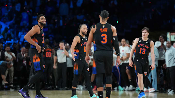 Dec 16, 2025; Las Vegas, Nevada, USA; New York Knicks center/forward Karl-Anthony Towns (32), guard Jalen Brunson (11), guard Josh Hart (3) and guard Tyler Kolek (13) celebrate after victory over the San Antonio Spurs in the Emirates NBA Cup Final at T-Mobile Arena. Mandatory Credit: Kirby Lee-Imagn Images