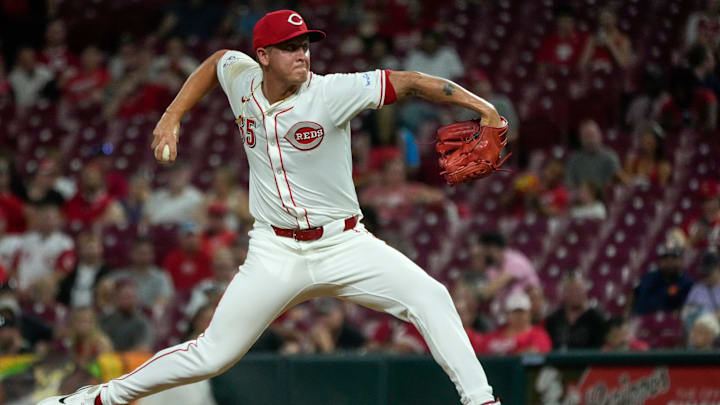 Cincinnati Reds pitcher Casey Legumina (65) delivers a pitch in the eighth inning of the MLB Interleague game between the Cincinnati Reds and the Oakland Athletics at Great American Ball Park in downtown Cincinnati on Tuesday, Aug. 27, 2024. The Oakland Athletics won 5-4.