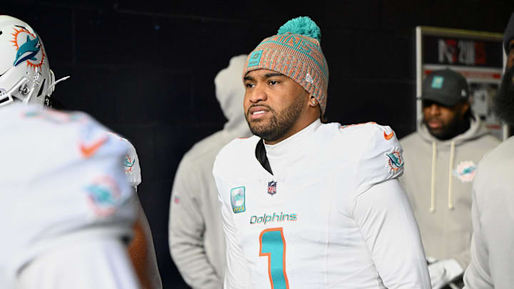 Jan 4, 2026; Foxborough, Massachusetts, USA; Miami Dolphins quarterback Tua Tagovailoa (1) walks out of the player tunnel before the game against the New England Patriots at Gillette Stadium. Mandatory Credit: Brian Fluharty-Imagn Images