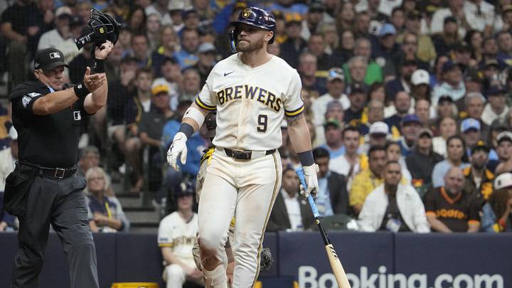 Oct 3, 2026; Milwaukee, Wisconsin, USA; Milwaukee Brewers first baseman Jake Bauers (9) reacts to a hit by a pitch during the fifth inning against the San Diego Padres at American Family Field. Mandatory Credit: Michael McLoone-Imagn Images Oct 3, 2026; Milwaukee, Wisconsin, USA; Milwaukee Brewers first baseman Jake Bauers (9) reacts to a hit by a pitch during the fifth inning against the San Diego Padres at American Family Field. Mandatory Credit: Michael McLoone-Imagn Images