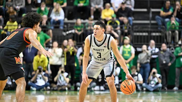 Jan 5, 2025; Eugene, Oregon, USA; Oregon Ducks guard Jackson Shelstad (3) dribbles the ball against the Maryland Terrapins during the second half at Matthew Knight Arena. Mandatory Credit: Craig Strobeck-Imagn Images