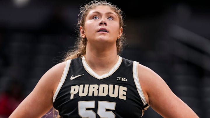 Purdue Boilermakers forward Avery Gordon (55) watches a free throw.