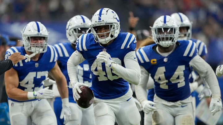 Indianapolis Colts cornerback Jaylon Jones (40) runs with the ball after making his second interception of the game Sunday, Sept. 22, 2024, during a game against the Chicago Bears at Lucas Oil Stadium in Indianapolis.