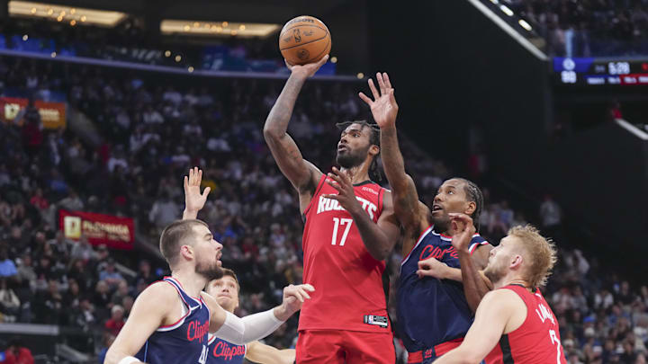Houston Rockets forward Tari Eason shoots against Los Angeles Clippers forward Kawhi Leonard.