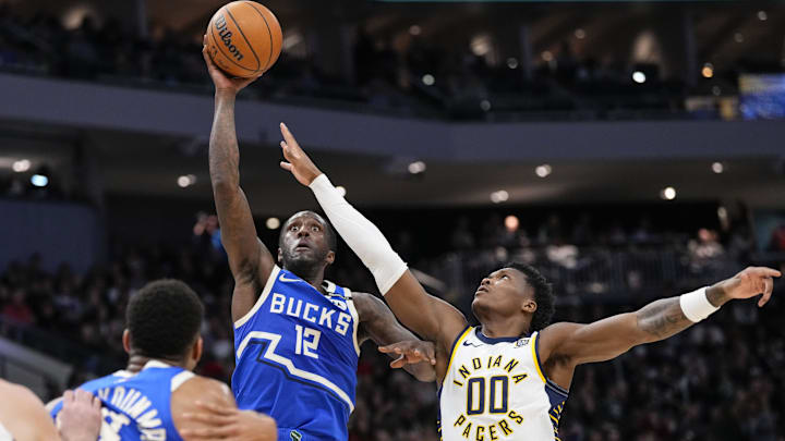 Milwaukee Bucks forward Taurean Prince shoots against Indiana Pacers guard Bennedict Mathurin during the third quarter at Fiserv Forum on Saturday.