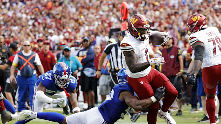 Washington Commanders wide receiver Deebo Samuel goes for a touchdown during the third quarter against the New York Giants