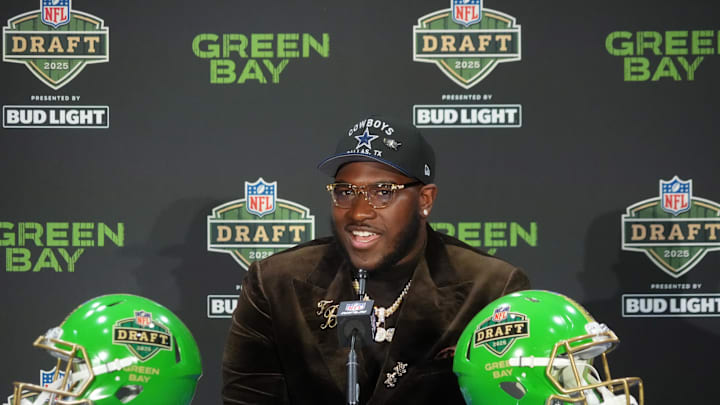 Apr 24, 2025; Green Bay, WI, USA; Tyler Booker speaks in a press conference after being selected by the Dallas Cowboys as the number 12 pick in the first round of the 2025 NFL Draft at Lambeau Field. Mandatory Credit: Kirby Lee-Imagn Images