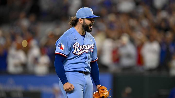 Jun 21, 2026; Arlington, Texas, USA; Texas Rangers relief pitcher Jakob Junis (16) celebrates the win against the San Diego Padres at Globe Life Field. Mandatory Credit: Jerome Miron-Imagn Images