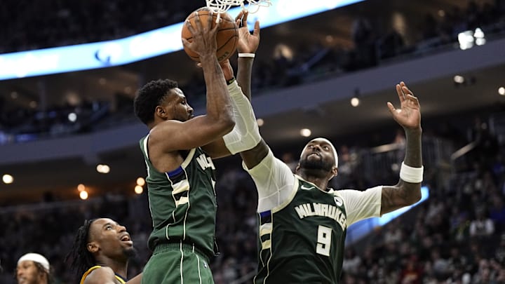 Apr 30, 2024; Milwaukee, Wisconsin, USA; Milwaukee Bucks guard Malik Beasley (5) and forward Bobby Portis (9) reach for a rebound during the fourth quarter against the Indiana Pacers during game five of the first round for the 2024 NBA playoffs at Fiserv Forum. Mandatory Credit: Jeff Hanisch-Imagn Images Apr 30, 2024; Milwaukee, Wisconsin, USA; Milwaukee Bucks guard Malik Beasley (5) and forward Bobby Portis (9) reach for a rebound during the fourth quarter against the Indiana Pacers during game five of the first round for the 2024 NBA playoffs at Fiserv Forum. Mandatory Credit: Jeff Hanisch-Imagn Images