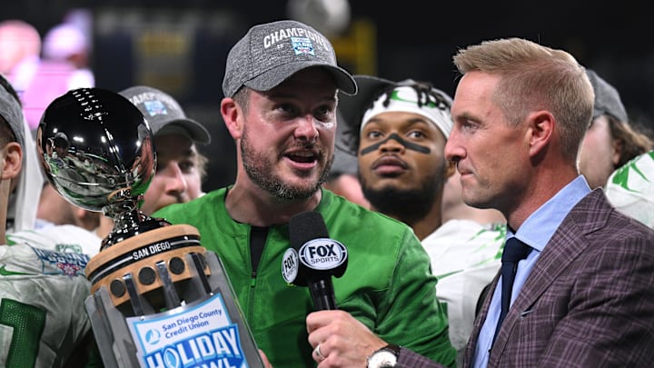 Dec 28, 2022; San Diego, CA, USA; Oregon Ducks head coach Dan Lanning speaks after receiving the winner   s trophy after defeating the Oregon Ducks in the 2022 Holiday Bowl at Petco Park. Mandatory Credit: Orlando Ramirez-Imagn Images