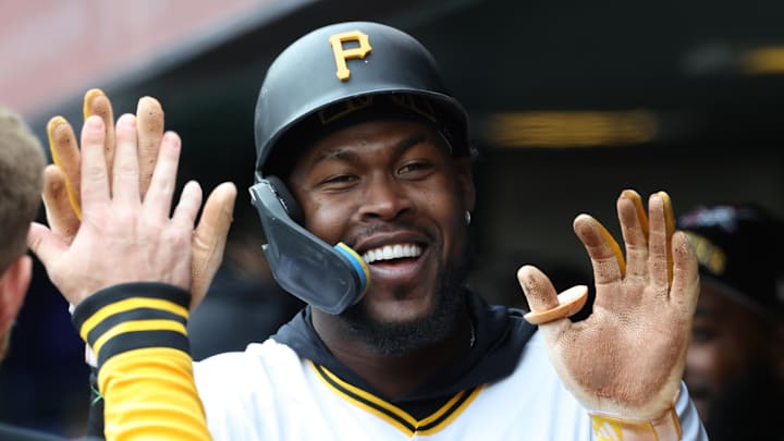 Apr 5, 2026; Pittsburgh, Pennsylvania, USA;  Pittsburgh Pirates center fielder Oneil Cruz (15) high-fives in the dugout after scoring a run against the Baltimore Orioles during the second inning at PNC Park. Mandatory Credit: Charles LeClaire-Imagn Images