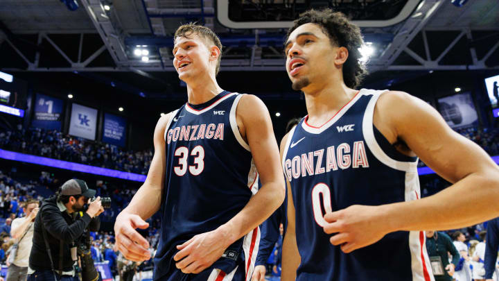 Feb 10, 2024; Lexington, Kentucky, USA; Gonzaga Bulldogs forward Ben Gregg (33) and guard Ryan Nembhard (0) walk off the court after a game against the Kentucky Wildcats at Rupp Arena at Central Bank Center. Mandatory Credit: Jordan Prather-USA TODAY Sports
