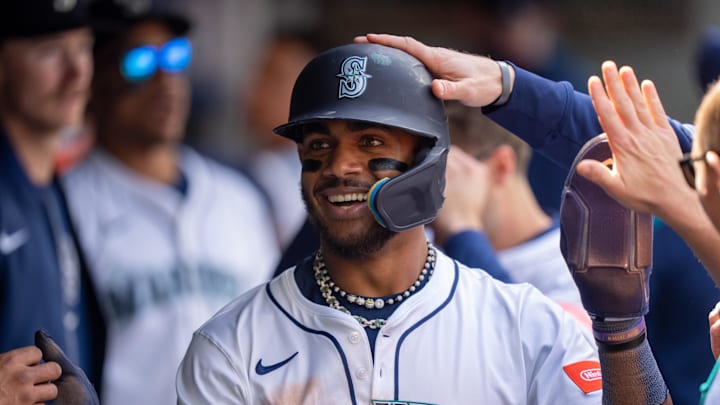 Seattle Mariners centerfielder Julio Rodriguez (44) celebrates after scoring a run during the seventh inning against the Los Angeles Angels at T-Mobile Park on April 30.