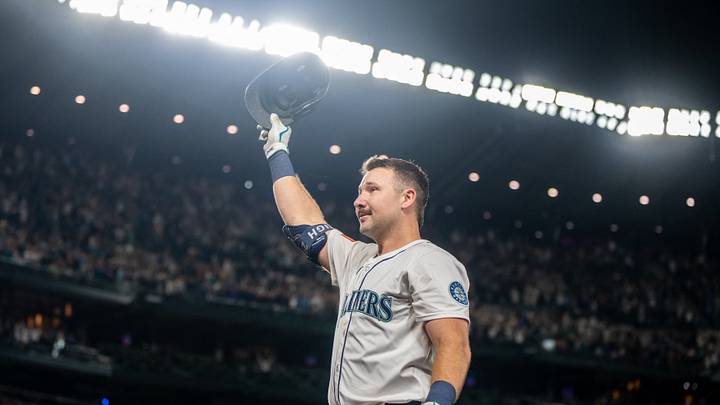 Sep 24, 2025; Seattle, Washington, USA; Seattle Mariners catcher Cal Raleigh (29) acknowledges the crowd after hitting his 60th home run of the season during the eighth inning against the Colorado Rockies at T-Mobile Park. Mandatory Credit: Stephen Brashear-Imagn Images