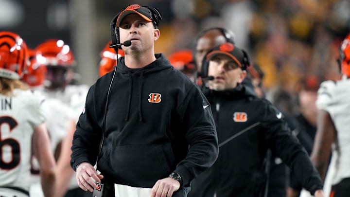Cincinnati Bengals head coach Zac Taylor watches a replay of a play in the end zone in the second