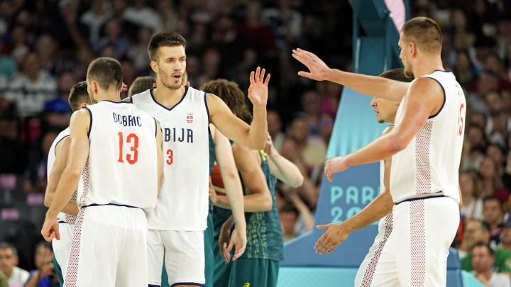 Aug 6, 2024; Paris, France; Serbia centre Filip Petrusev (3) and power forward Nikola Jokic (15) react after a play against Australia in men’s basketball quarterfinals during the Paris 2024 Olympic Summer Games at Accor Arena. Mandatory Credit: Kyle Terada-USA TODAY Sports