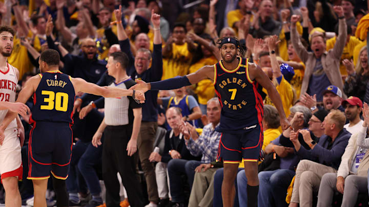 Apr 28, 2025; San Francisco, California, USA; Golden State Warriors guard Stephen Curry (30) high fives guard Buddy Hield (7) after Hield scored a basket against the Houston Rockets during the fourth quarter of game four of the 2025 NBA Playoffs first round at Chase Center. Mandatory Credit: Kelley L Cox-Imagn Images