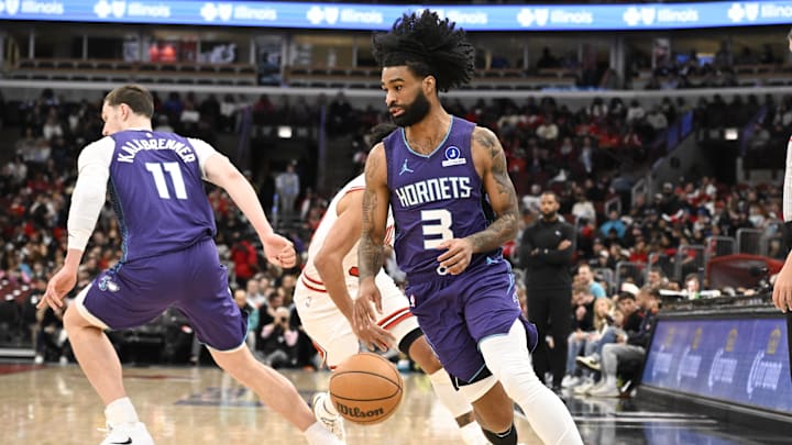 Charlotte Hornets guard Coby White (3) moves the ball against the Chicago Bulls during the first half Charlotte Hornets guard Coby White (3) moves the ball against the Chicago Bulls during the first half