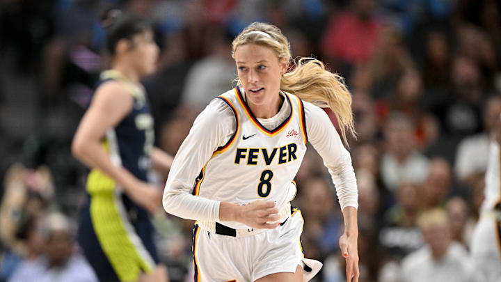 Aug 1, 2025; Dallas, Texas, USA;  Indiana Fever guard Sophie Cunningham (8) runs back up the court during the second half against the Dallas Wings at the American Airlines Center. Mandatory Credit: Jerome Miron-Imagn Images