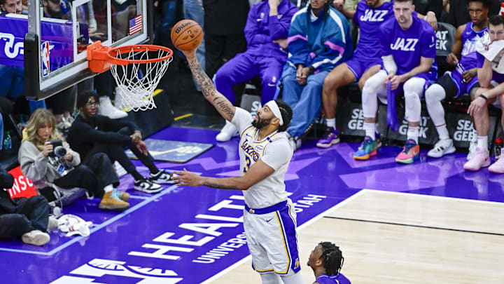 Dec 1, 2024; Salt Lake City, Utah, USA; Los Angeles Lakers forward/center Anthony Davis (3) shoots over Utah Jazz guard Isaiah Collier (13) during the second half at the Delta Center. Mandatory Credit: Christopher Creveling-Imagn Images Dec 1, 2024; Salt Lake City, Utah, USA; Los Angeles Lakers forward/center Anthony Davis (3) shoots over Utah Jazz guard Isaiah Collier (13) during the second half at the Delta Center. Mandatory Credit: Christopher Creveling-Imagn Images