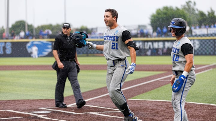 Jun 1, 2024; Lexington, KY, USA; Kentucky Wildcats outfielder Ryan Waldschmidt (21) celebrates after hitting a home run during the ninth inning against the Illinois Fighting Illini at Kentucky Proud Park. Mandatory Credit: Jordan Prather-Imagn Images