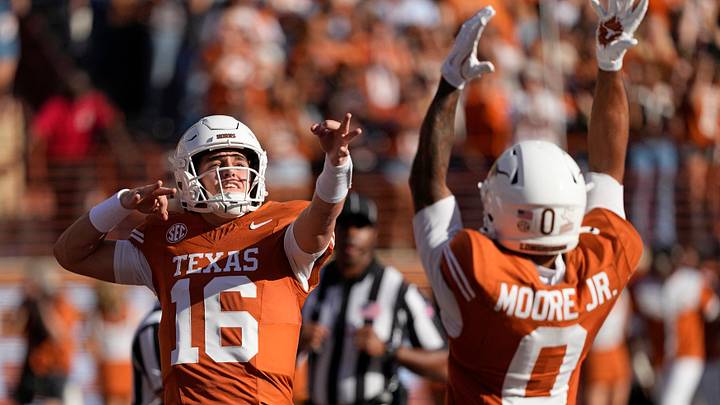 Nov 22, 2025; Austin, Texas, USA; Texas Longhorns quarterback Arch Manning (16) reacts after throwing a touchdown pass in the first half against the Arkansas Razorbacks at Darrell K Royal-Texas Memorial Stadium. Mandatory Credit: Scott Wachter-Imagn Images Nov 22, 2025; Austin, Texas, USA; Texas Longhorns quarterback Arch Manning (16) reacts after throwing a touchdown pass in the first half against the Arkansas Razorbacks at Darrell K Royal-Texas Memorial Stadium. Mandatory Credit: Scott Wachter-Imagn Images