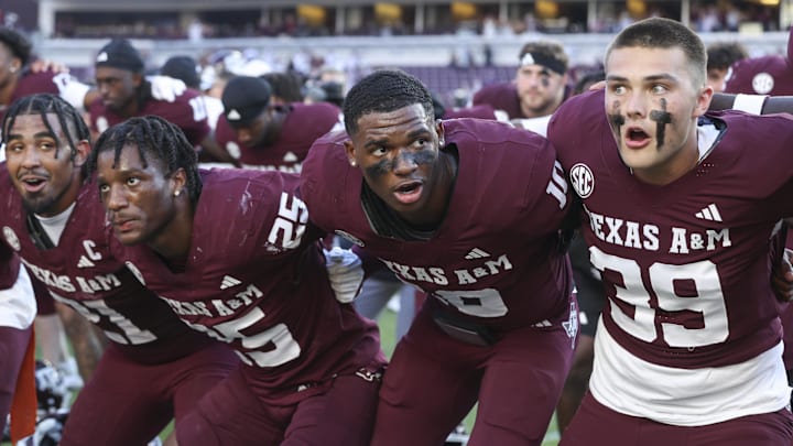 Sep 27, 2025; College Station, Texas, USA; Texas A&M Aggies quarterback Marcel Reed (10) celebrates with teammates after the game against the Auburn Tigers at Kyle Field. Mandatory Credit: Troy Taormina-Imagn Images