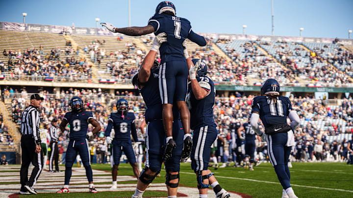 Nov 1, 2025; East Hartford, Connecticut, USA; UConn Huskies wide receiver Skyler Bell (1) celebrates after his touchdown against the UAB Blazers in the first quarter at Pratt & Whitney Stadium at Rentschler Field. Mandatory Credit: David Butler II-Imagn Images Nov 1, 2025; East Hartford, Connecticut, USA; UConn Huskies wide receiver Skyler Bell (1) celebrates after his touchdown against the UAB Blazers in the first quarter at Pratt & Whitney Stadium at Rentschler Field. Mandatory Credit: David Butler II-Imagn Images