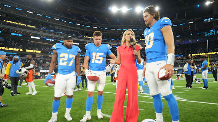 Nov 17, 2024; Inglewood, California, USA; NBC Sunday Night Football sideline reporter Melissa Stark (second from right) interviews Los Angeles Chargers quarterback Justin Herbert (10), running back J.K. Dobbins (27) and wide receiver Ladd McConkey (15) after the game against the Cincinnati Bengals at SoFi Stadium. Mandatory Credit: Kirby Lee-Imagn Images