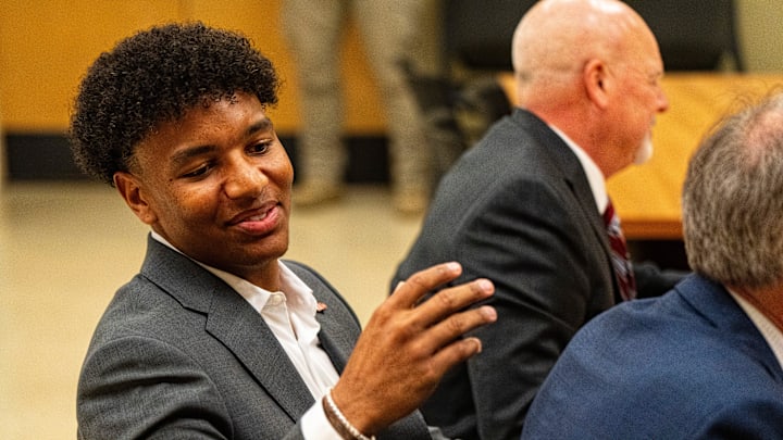 Ole Miss quarterback Trinidad Chambliss shakes hands with members of his legal team after the hearing of Chambliss in his lawsuit against the NCAA at Calhoun County Courthouse in Pittsboro, Miss., on Thursday, Feb. 12, 2026. Chambliss was granted a preliminary injunction against the NCAA.