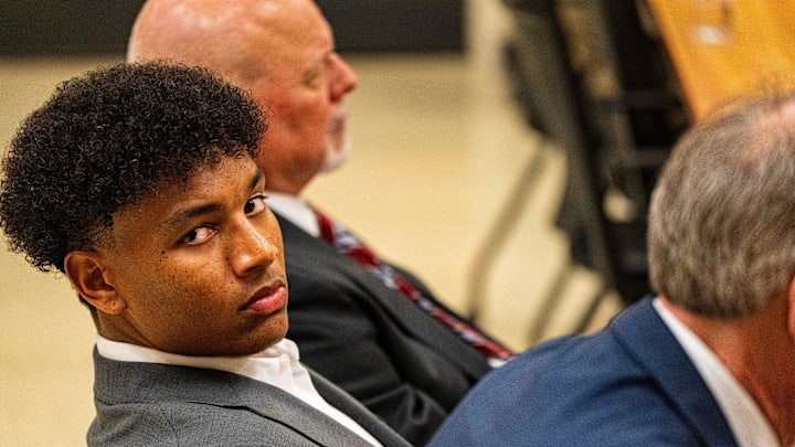 Ole Miss quarterback Trinidad Chambliss looks over at members of the press during the hearing of Chambliss in his lawsuit against the NCAA at Calhoun County Courthouse in Pittsboro, Miss., on Thursday, Feb. 12, 2026. Chambliss was granted a preliminary injunction against the NCAA.