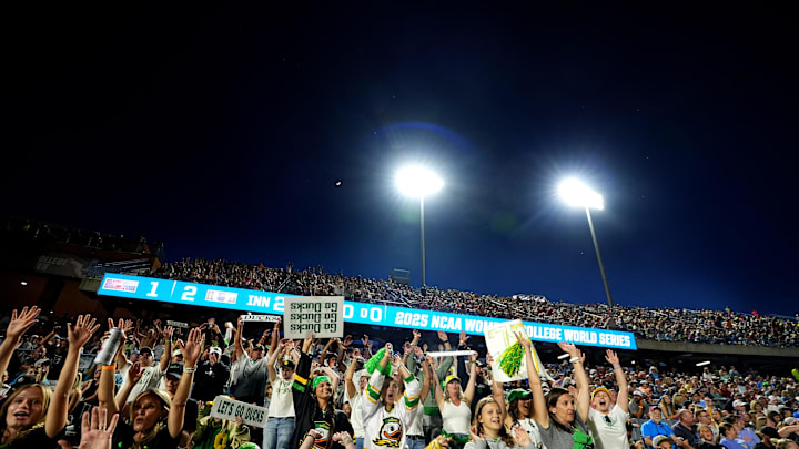 Oregon fans cheer during following Women's College World Series softball game between the Oregon Ducks and the Ole Miss Rebels at Devon Park in Oklahoma City, Friday, May, 30, 2025.