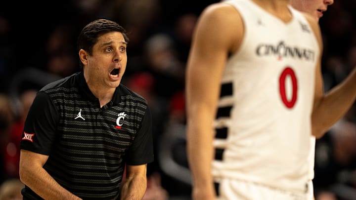 Cincinnati Bearcats head coach Wes Miller coaches in the second half of the NCAA basketball game against the Arizona Wildcats at the Fifth Third Arena in Cincinnati on Saturday, January 4, 2025. Cincinnati Bearcats head coach Wes Miller coaches in the second half of the NCAA basketball game against the Arizona Wildcats at the Fifth Third Arena in Cincinnati on Saturday, January 4, 2025.
