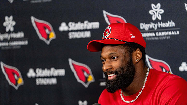 Josh Sweat speaks to members of the media at the Arizona Cardinals Training Center in Tempe