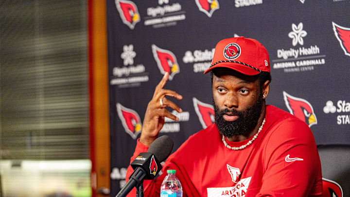 Josh Sweat speaks to members of the media at the Arizona Cardinals Training Center