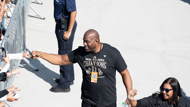 Los Angeles Dodgers minority owner and former Los Angeles Laker Magic Johnson arrives at Dodger Stadium for the team’s World Series Championship celebration on Nov. 1, 2024.