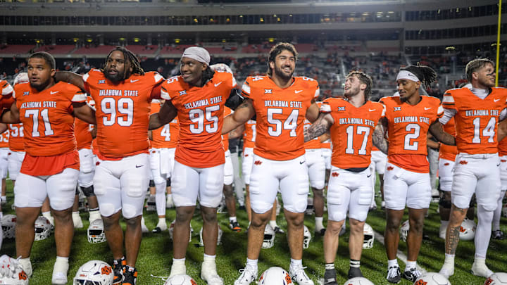 Oklahoma State players sing together after an NCAA football game between Oklahoma State (OSU) and UT Martin in Stillwater, Okla., on Thursday, Aug. 28, 2025. Oklahoma State players sing together after an NCAA football game between Oklahoma State (OSU) and UT Martin in Stillwater, Okla., on Thursday, Aug. 28, 2025.