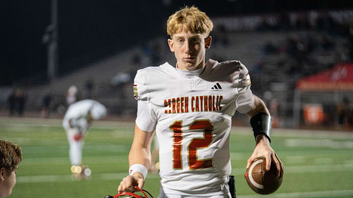 Bergen Catholic's Trey Tagliaferri (12) warms up on the field before a Non-Public, Group A semifinal football game between Don Bosco and Bergen Catholic at Granatell Stadium in Ramsey on Friday, Nov. 21, 2025.