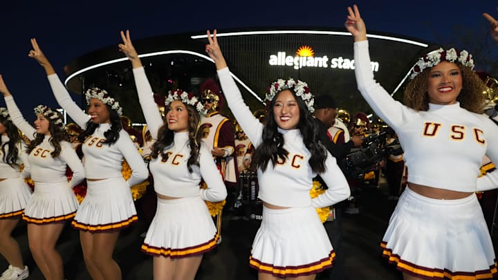 Dec 27, 2024; Las Vegas, NV, USA; Southern California Trojans song girls cheerleaders perform at a tailgate pep rally during the Las Vegas Bowl at Allegiant Stadium. Mandatory Credit: Kirby Lee-Imagn Images