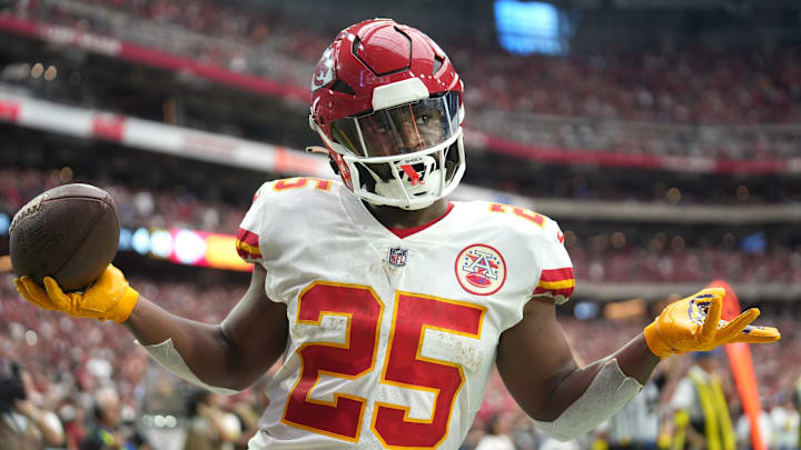 Glendale, Arizona, United States; Kansas City Chiefs running back Clyde Edwards-Helaire (25) shrugs as he walks into the end zone untouched for a score against the Arizona Cardinals at State Farm Stadium.