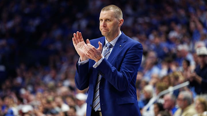 Mar 7, 2026; Lexington, Kentucky, USA; Kentucky Wildcats head coach Mark Pope claps during the first half against the Florida Gators at Rupp Arena at Central Bank Center.